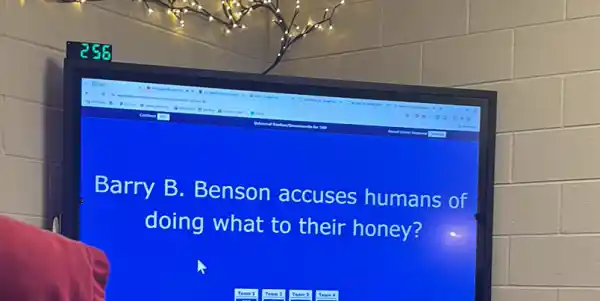 Barry B . Benson accuses humans of
doing what to their honey?